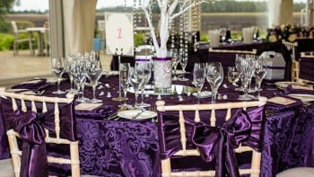 purple and gold wedding table settings